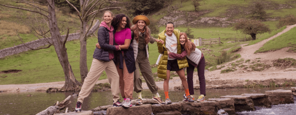 Merrell brand image with people in the outdoors shown on website 