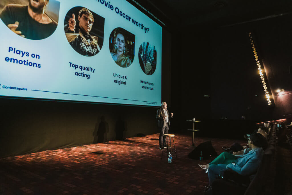 image of a speaker on stage